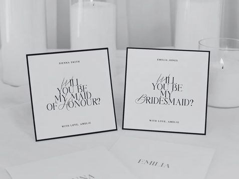 Two bridesmaid proposal cards in black and white